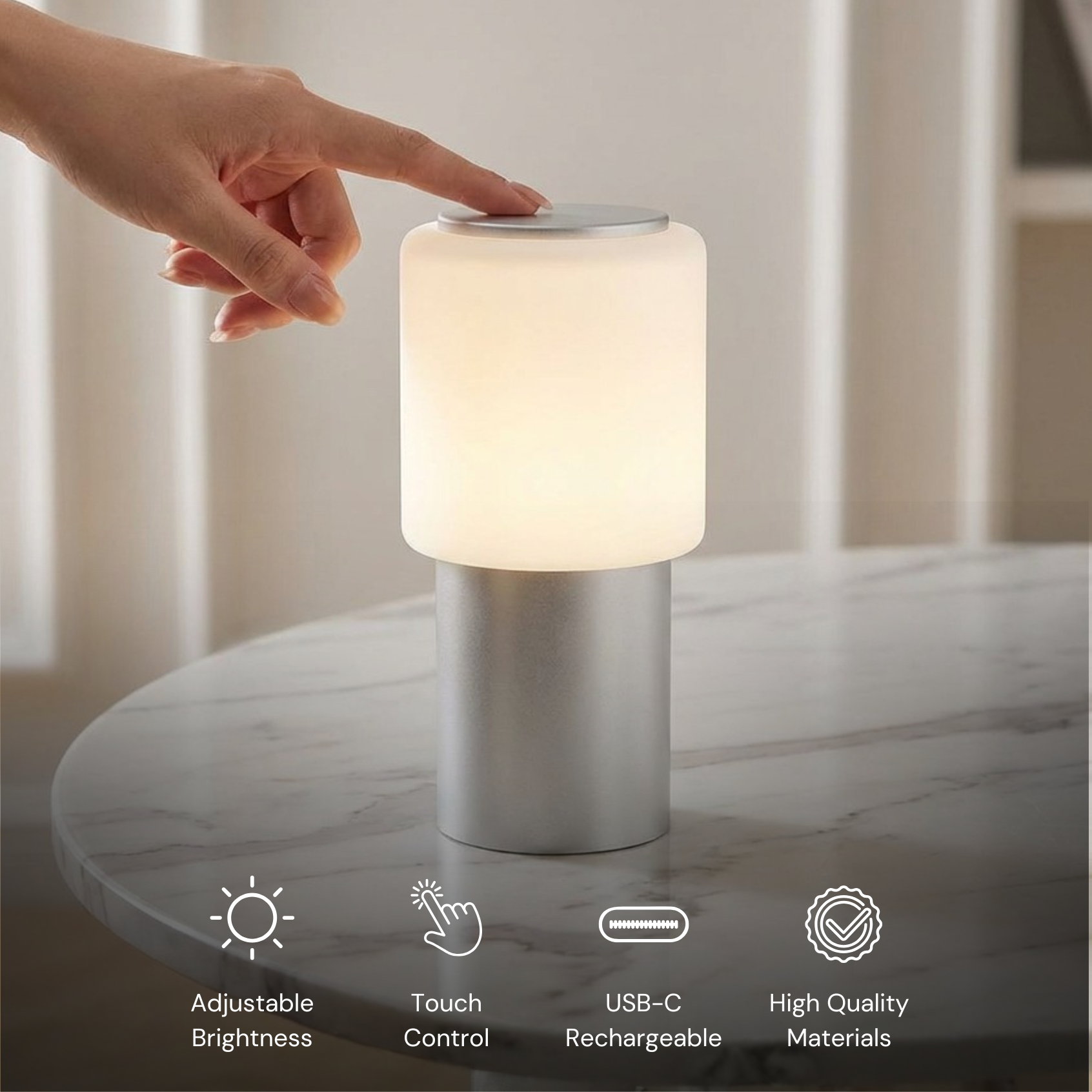 Sole Mio Table Lamp with adjustable brightness and touch control, featuring a silver base and frosted white shade.