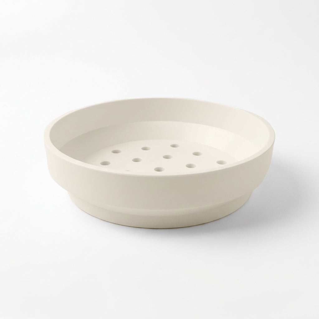 Drip Tray Disc in white with drainage holes for plant pots.